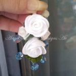 lapel-white-roses-with-aquamarine-leaves-ACDAu